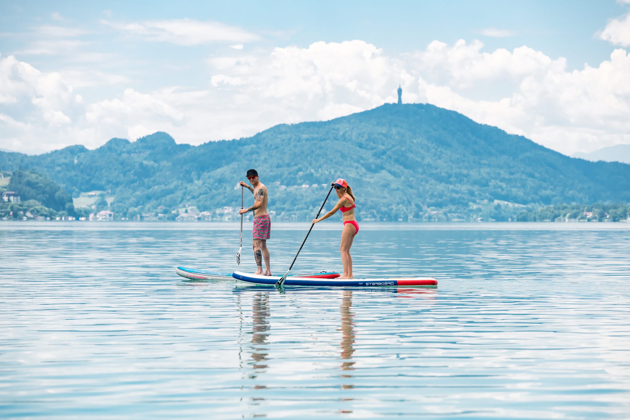 mann und Frau bei SUP-Tour am Wörthersee 